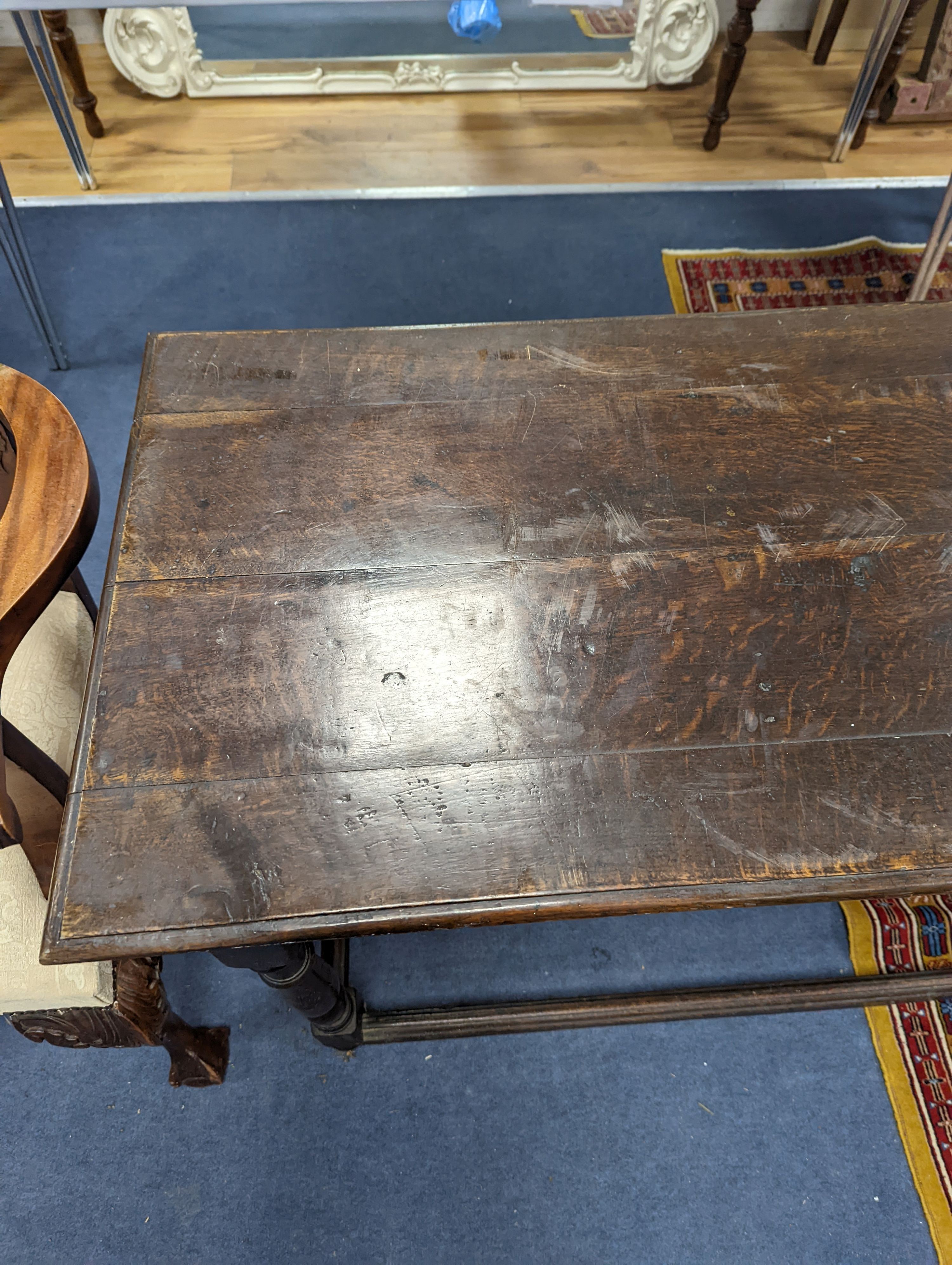 An 18th century rectangular oak table, width 112cm, depth 54cm, height 76cm